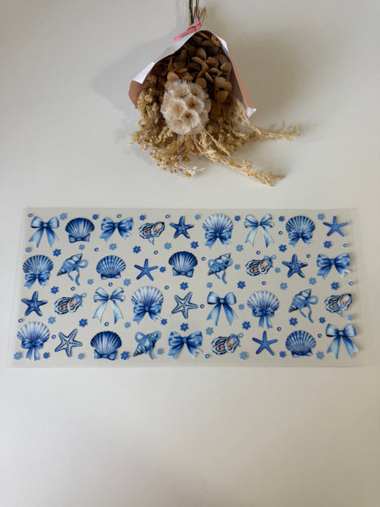 Blue starfish seashells and bows uv dtf wrap